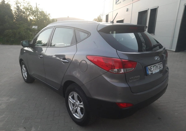 Hyundai Tucson cena 38500 przebieg: 155475, rok produkcji 2012 z Mrągowo małe 301